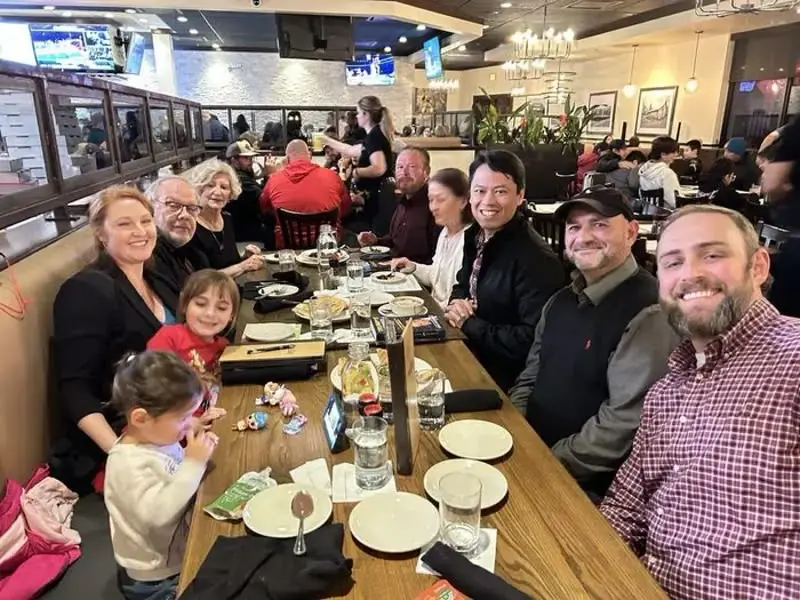 Discover Church partners in fellowship at a restaurant gathering, building Christian community with Pastor Steve Cioccolanti