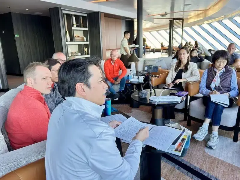 Partners of Discover Church in a Bible teaching session aboard a cruise ship lounge during a ministry pilgrimage tour