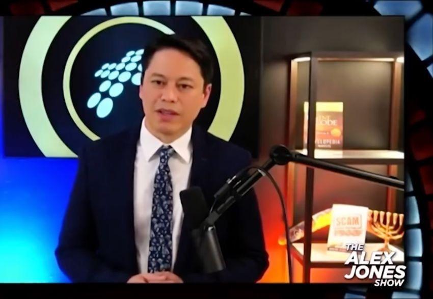 Pastor Steve Cioccolanti on The Alex Jones Show on InfoWars speaking into a broadcast microphone