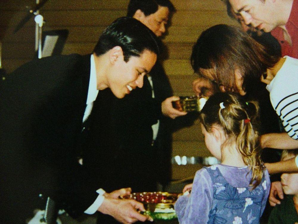 Pastor Steve Cioccolanti serving communion at a church service in 2004